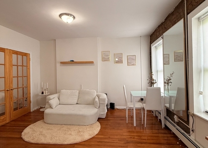 173 East 117th Street - Photo 1