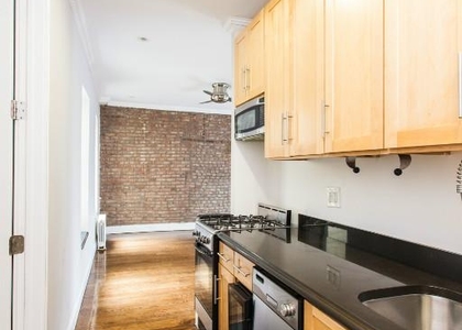  326 E 100th St.  - Photo 1