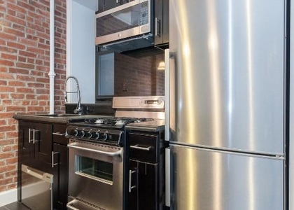  434 W 52nd St - Photo 1