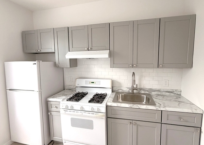 90-18 77th St - Photo 1