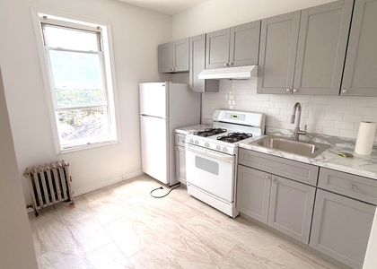 90-18 77th St - Photo 1