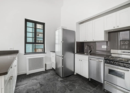 310 East 44th Street - Photo 1