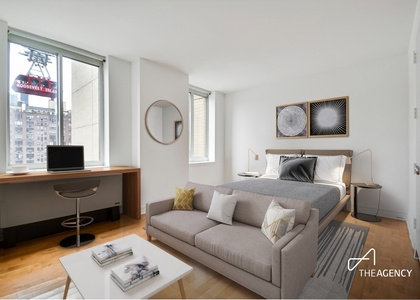 401 E 60th Street - Photo 1