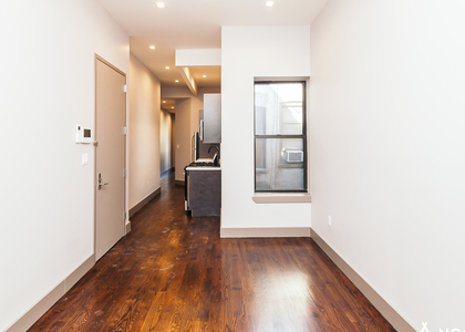 17-13 Gates Ave - Photo 1
