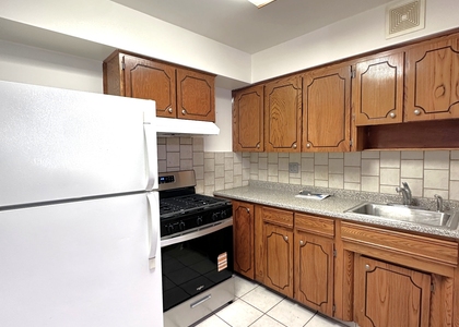 65-12 Maurice ave - Photo 1