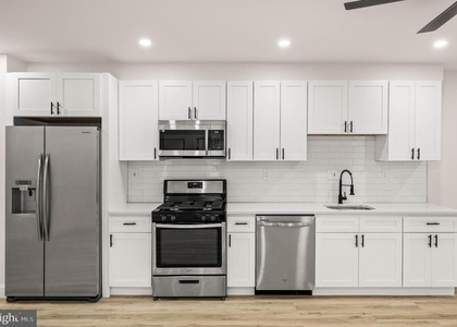 437 W Girard Avenue - Photo 1