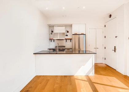 55-27 Myrtle Avenue - Photo 1