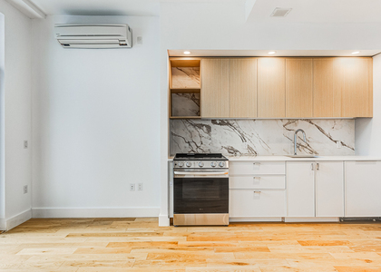 38-38 32nd St 11101 - Photo 1