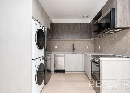 37-25 32nd Street - Photo 1