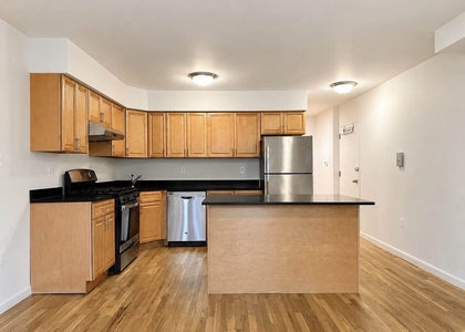 73-04 Ditmars Boulevard - Photo 1