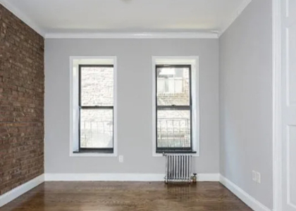 E 100th St - Photo 1