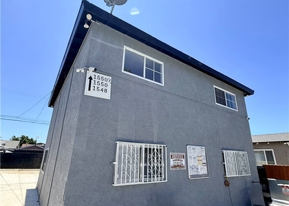 1550 1/2 W 59th Place - Photo 1