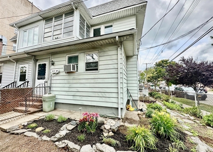 213-49 39th Avenue - Photo 1