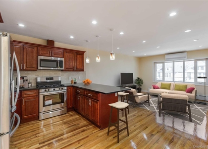 70-14 Olcott Street - Photo 1