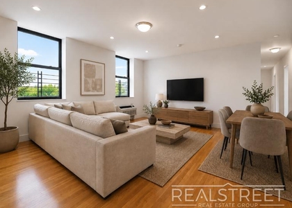90-02 Queens Blvd - Photo 1