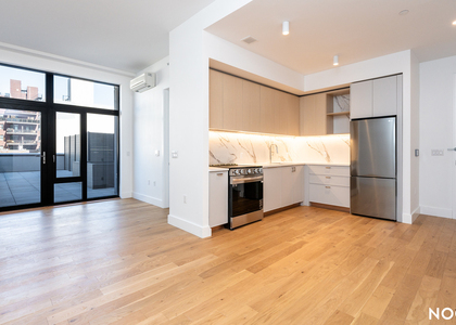 38-38 32nd St 11101 - Photo 1