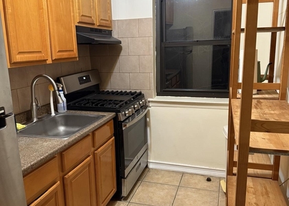 144-46 77th - Photo 1