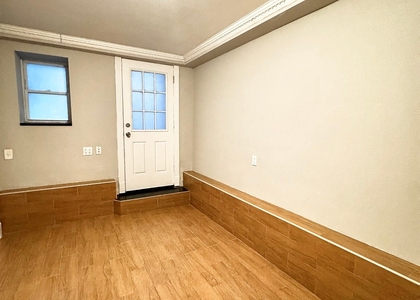 E 100th St - Photo 1