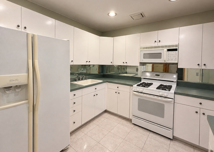 64-12 77th Pl - Photo 1