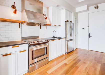 55-27 Myrtle Avenue - Photo 1