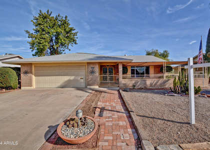 10933 W Tropicana Circle - Photo 1