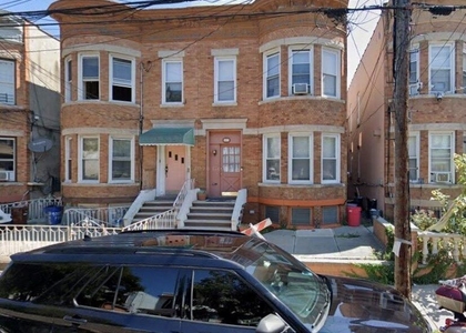 90-11 77th Street - Photo 1