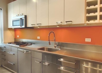 82-16 34th Avenue - Photo 1