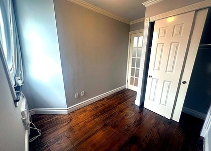 West 14th Street — 2 Bed - Photo 1