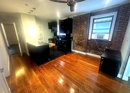 West 52nd Street — 3 Bed - Photo 1
