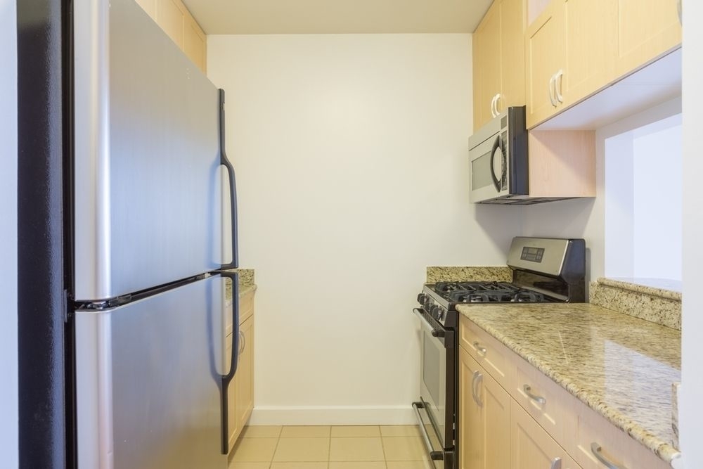 235 West 48th Street, Apt. 18F - Photo 0