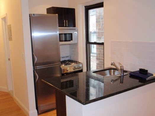 332 East 71st Street - Photo 0