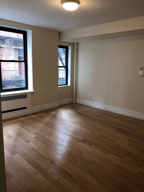 124 E 24th Street  - Photo 1