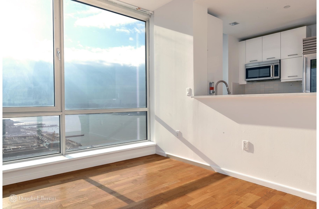 635 West 42nd St - Photo 1