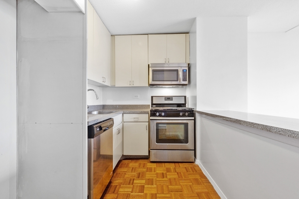 East 52nd  - Photo 1