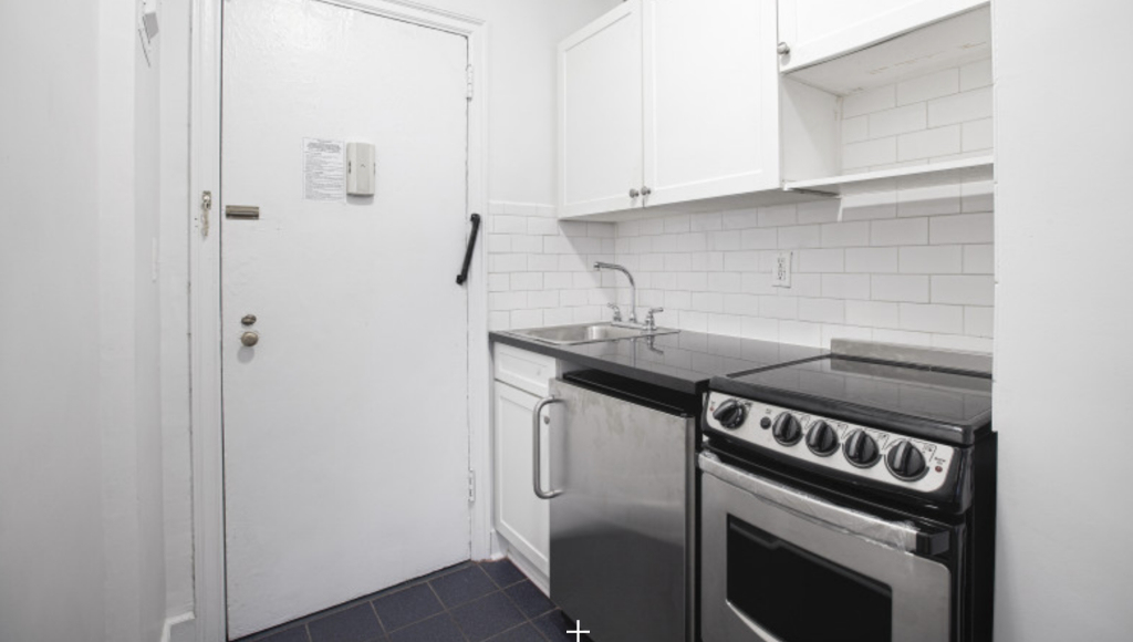 310 East 44th Street - Photo 1