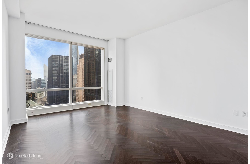 230 West 56th St - Photo 5