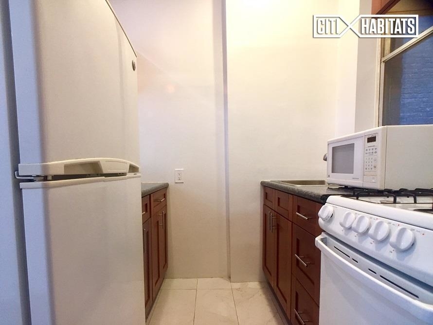 209 east 83 - Photo 1