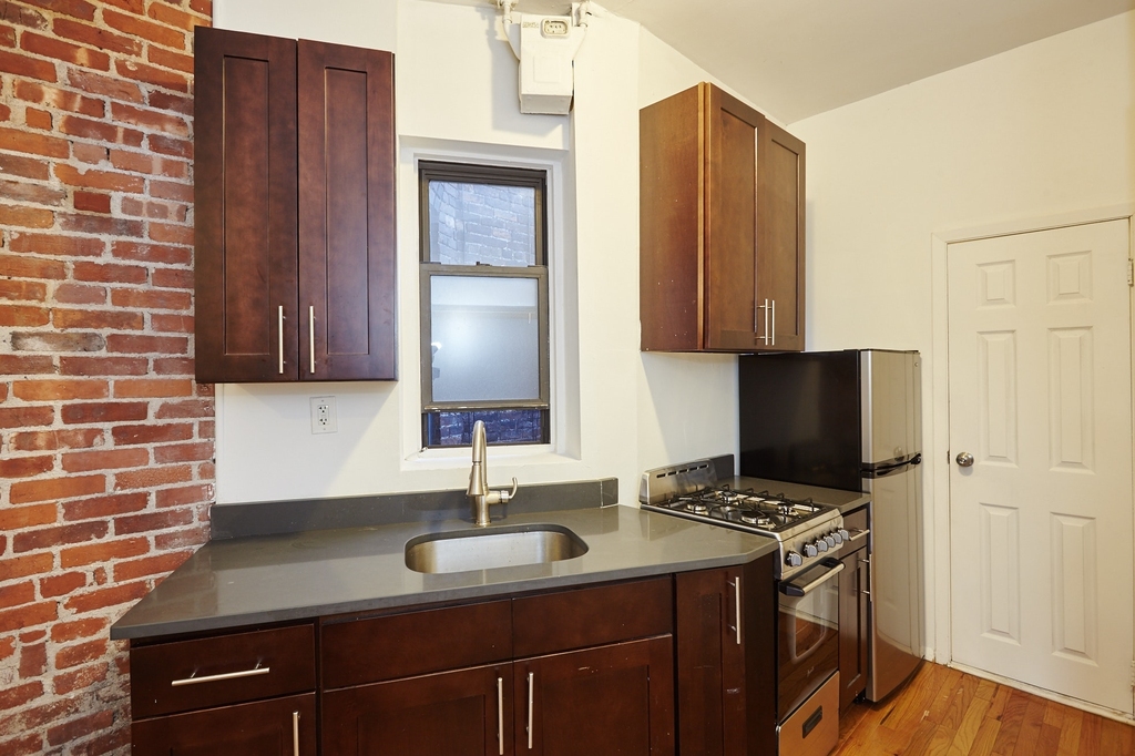 437 W 46th St - Photo 1