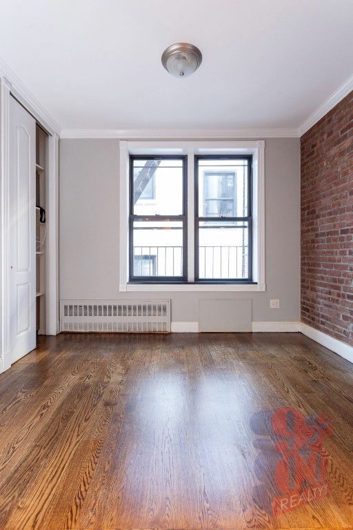 209 E 25th - Photo 0