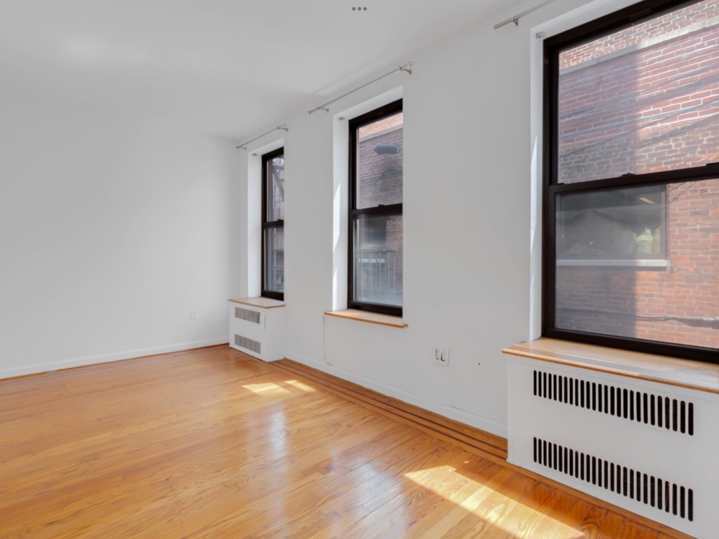 211 East 10th Street - Photo 0