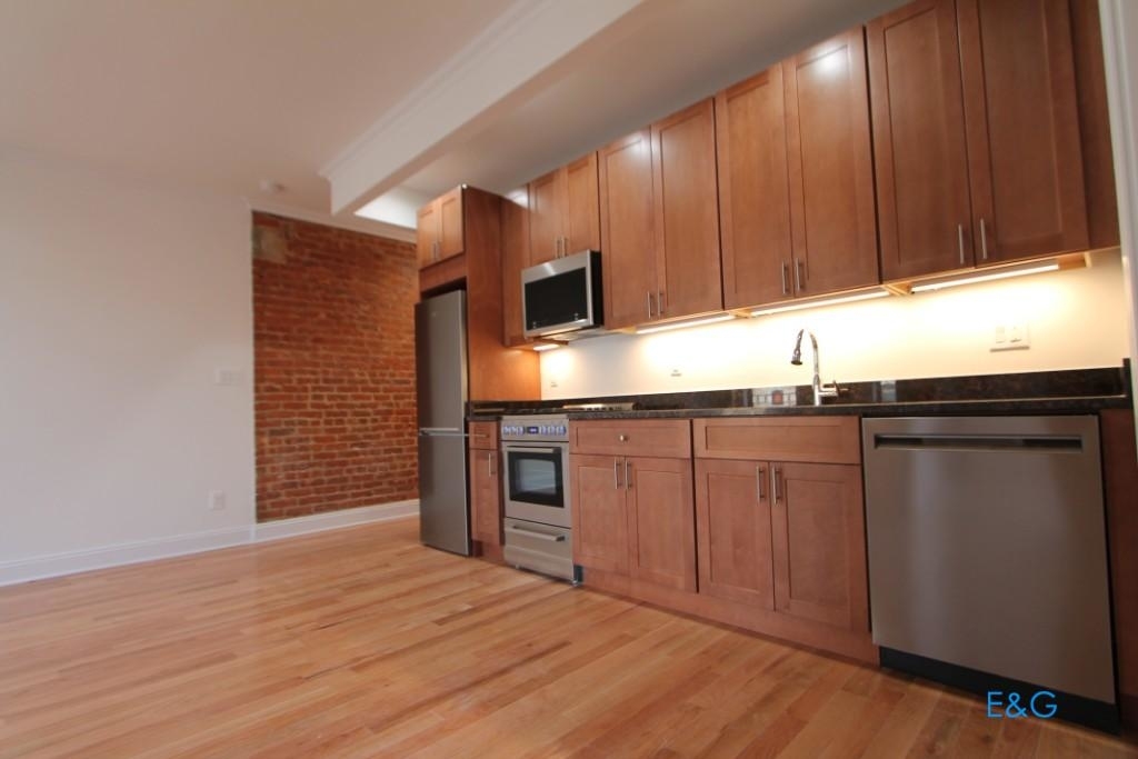 571 W  175th Street - Photo 1