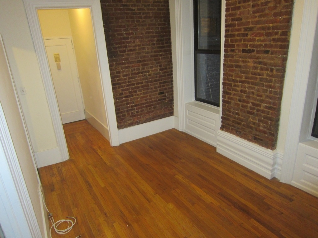 W 11st   - Photo 1