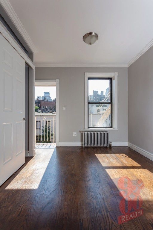 213 E 26th - Photo 0