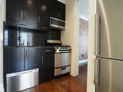 459 west 50th st  - Photo 2