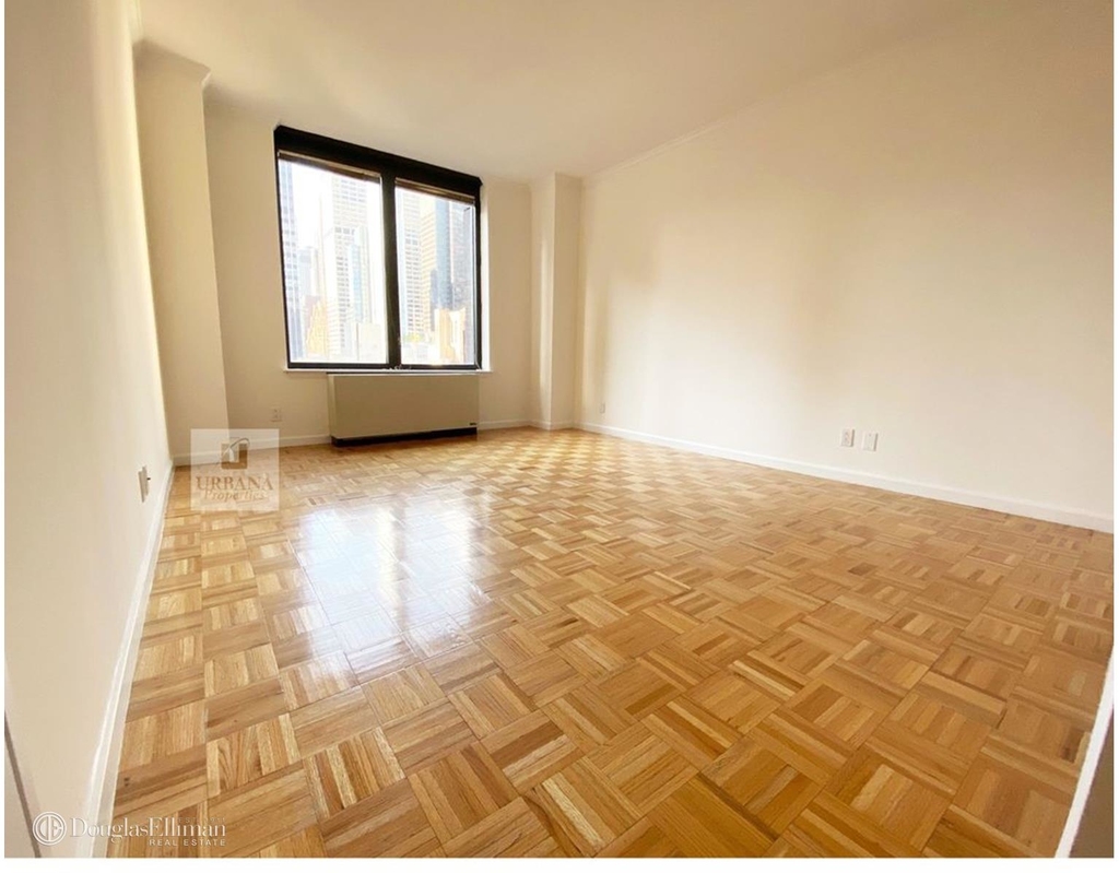 150 East 57th St - Photo 5