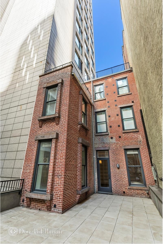 34 East 61st St - Photo 9