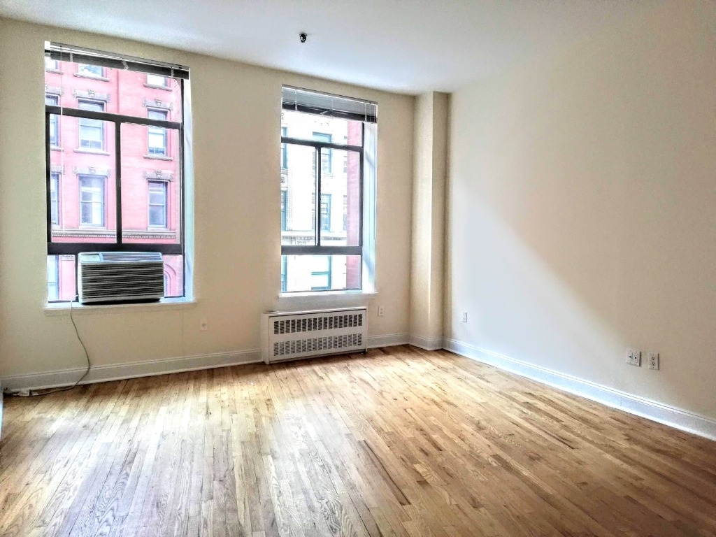 1 Astor place Loft, Sun-drenched, High Ceilings, Doorman, Elevator  - Photo 0