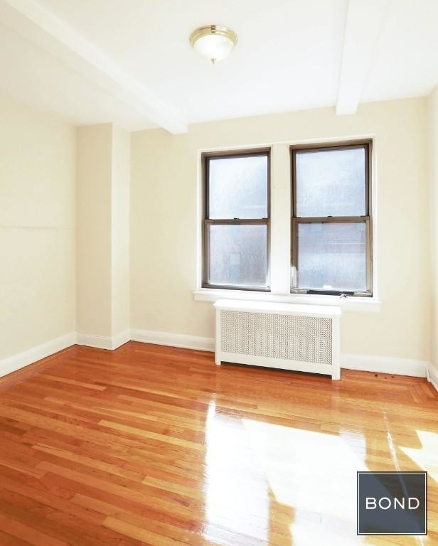 East 38 Street  - Photo 2