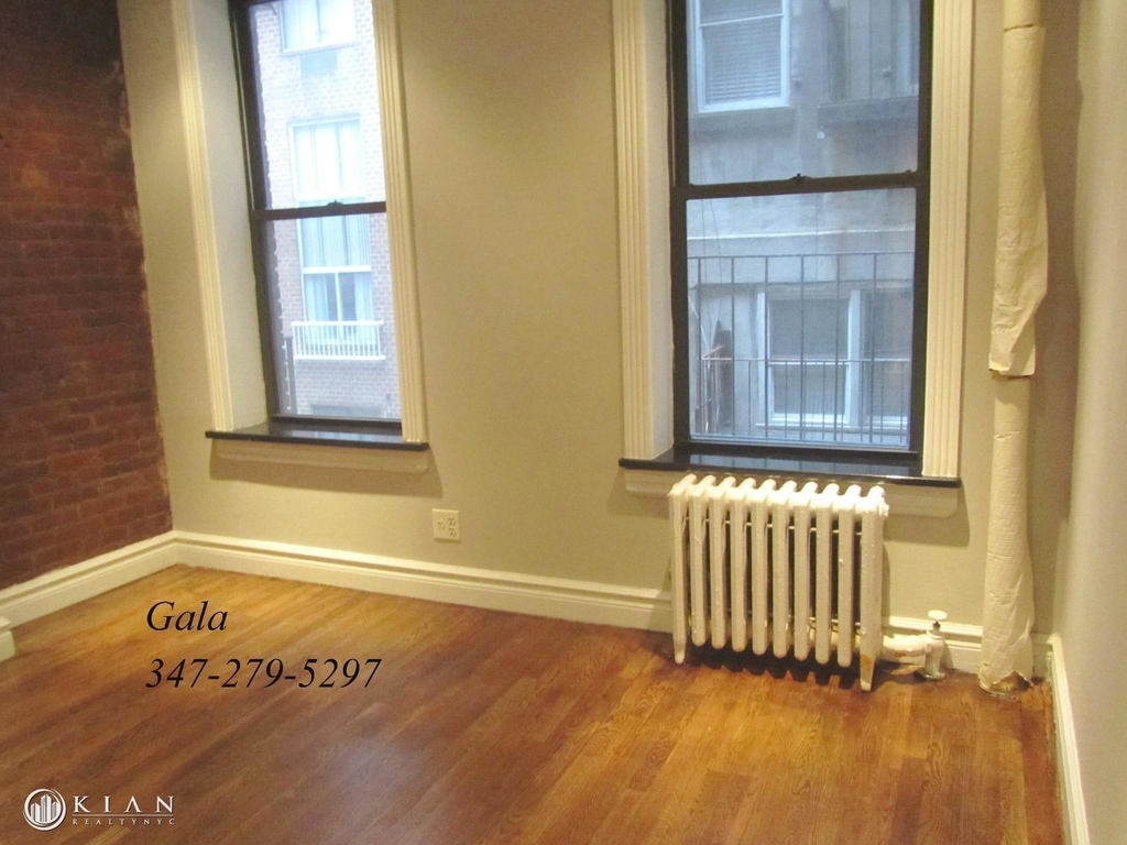 E 23rd St. - Photo 2