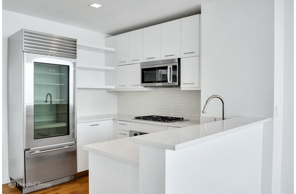 635 West 42nd St - Photo 1